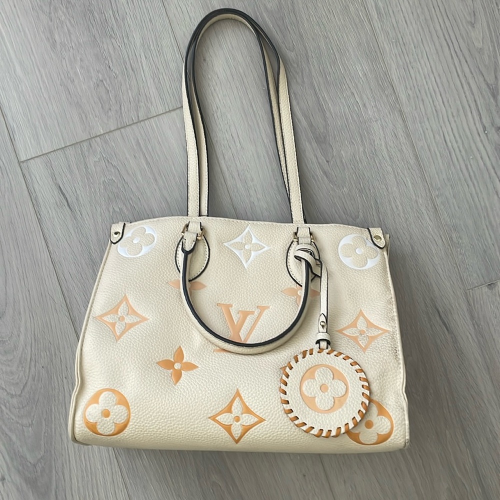 LV On the Go pool collection purse